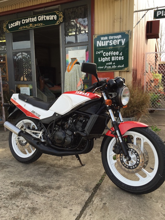 1986 Yamaha RZ250 parked out the front of a local servo